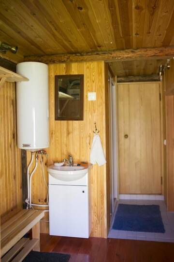 Фото номера Четырехместный номер с камином Дома для отпуска Rosma Mill Holiday House г. Пылва 7