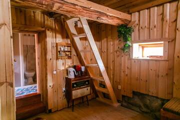 Фото номера Четырехместный номер с камином Дома для отпуска Rosma Mill Holiday House г. Пылва 4
